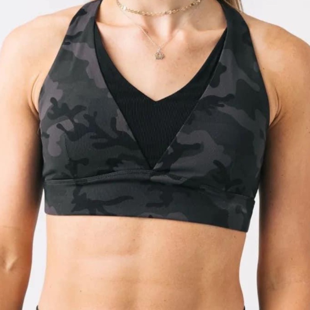 Sports bra AND bike shorts. Purchased, but never worn.